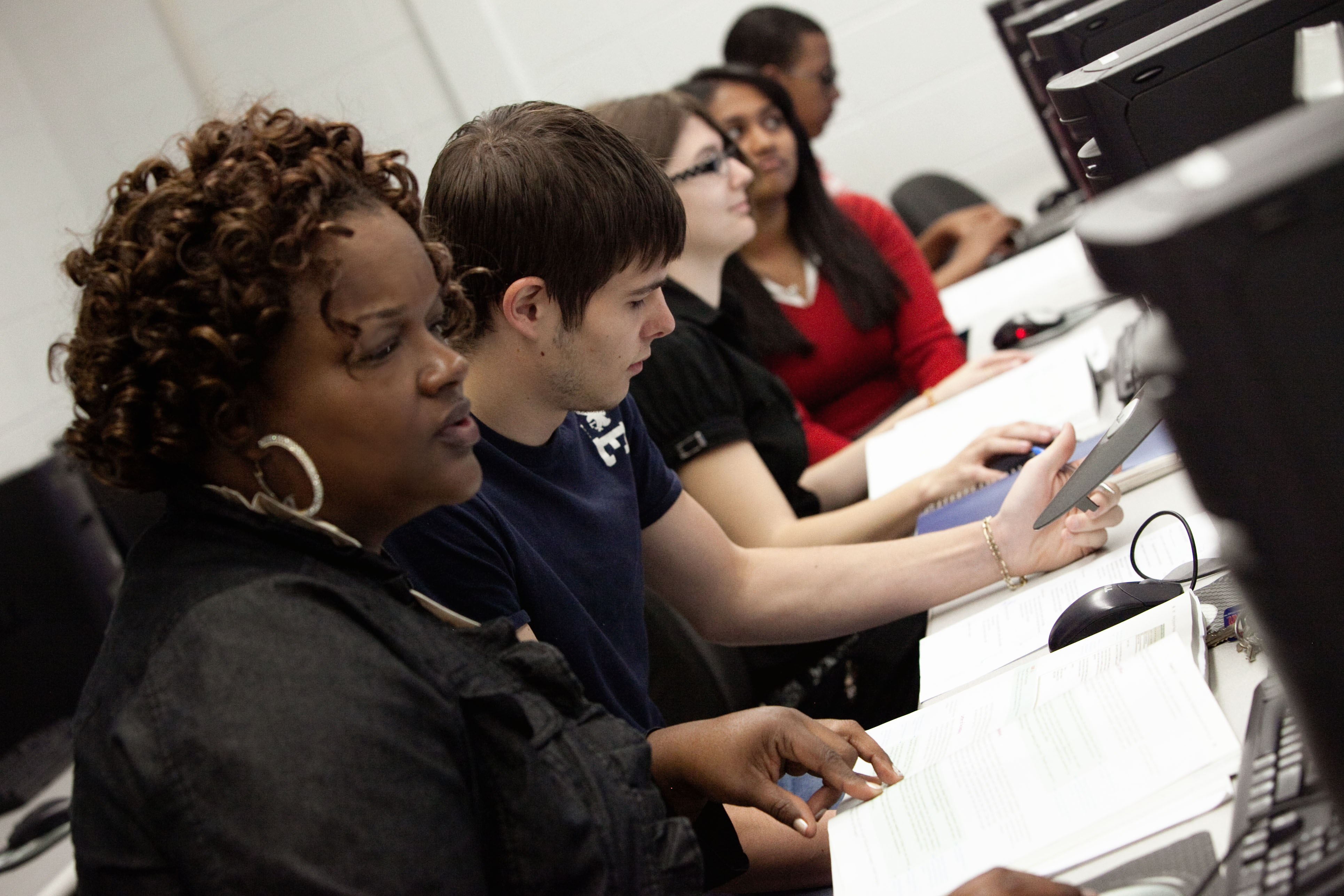 Students in class in front of PCs